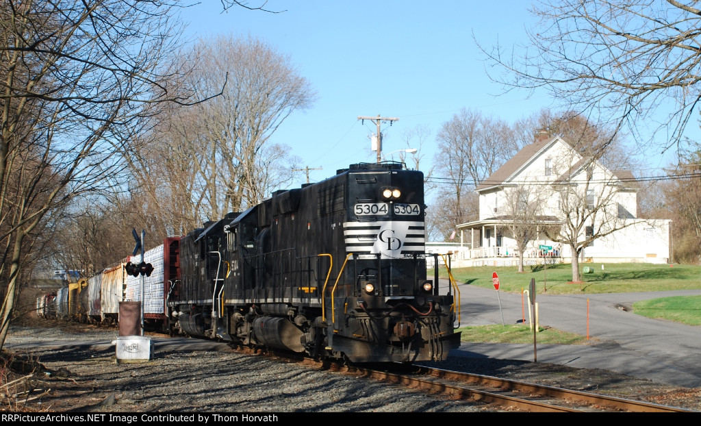 RP1 heads east with a sixteen car consist of mixed freight